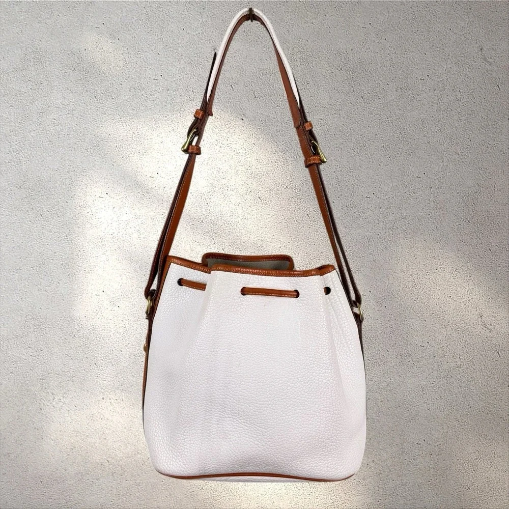 Dooney & Bourke Vintage White Tan Leather Drawstring Bucket Bag AWL Tassel USA